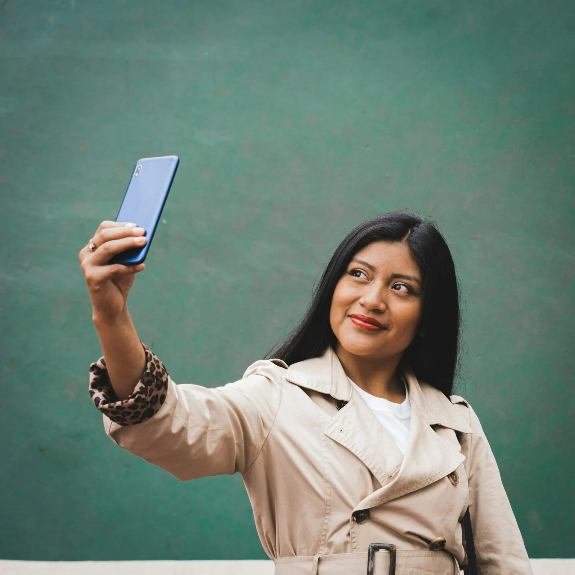 a woman taking a selfie